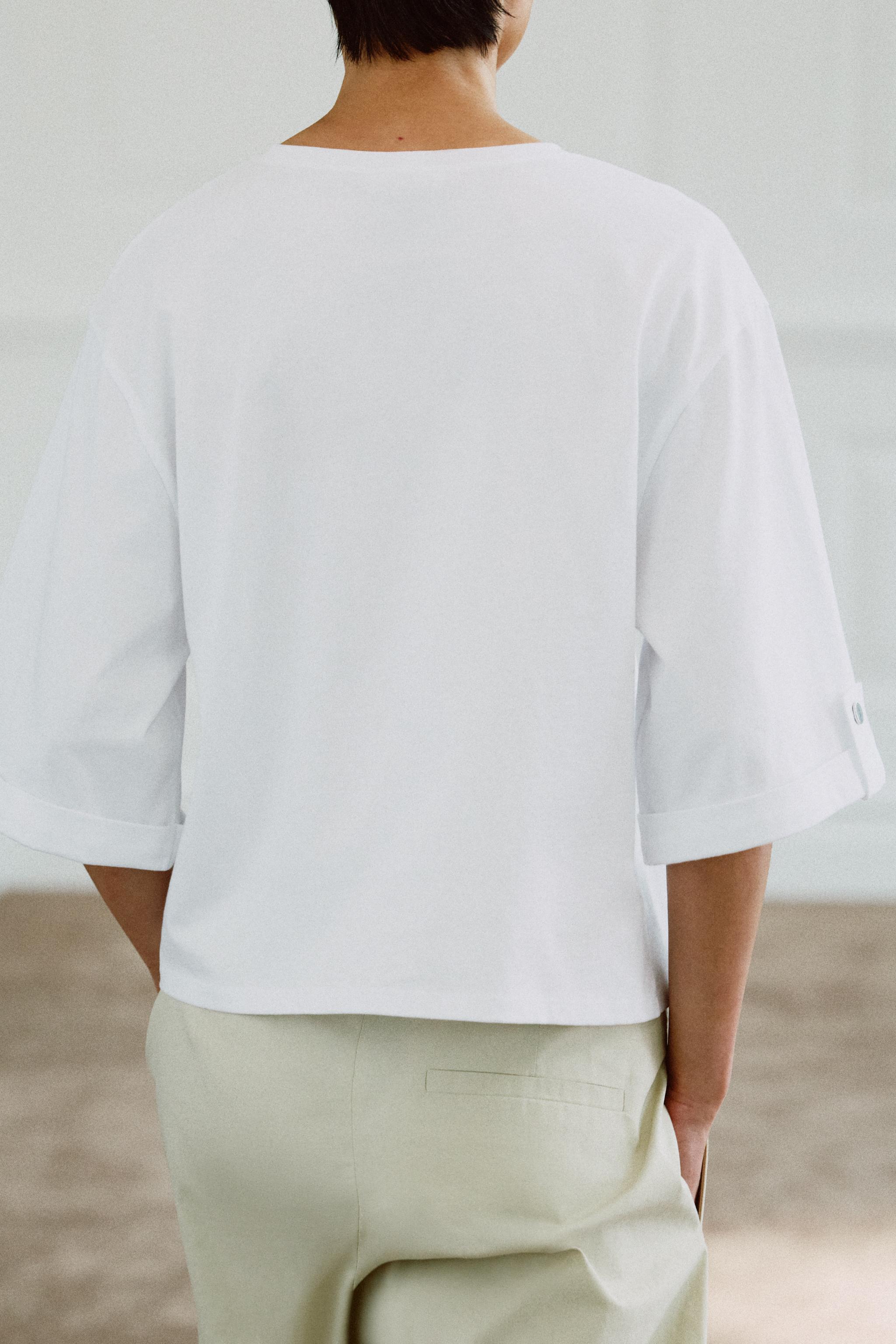 BUTTONED ASYMMETRIC T-SHIRT